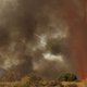 Illustration for article titled Terrifying Images Of Whirling Firenadoes From All Over The World